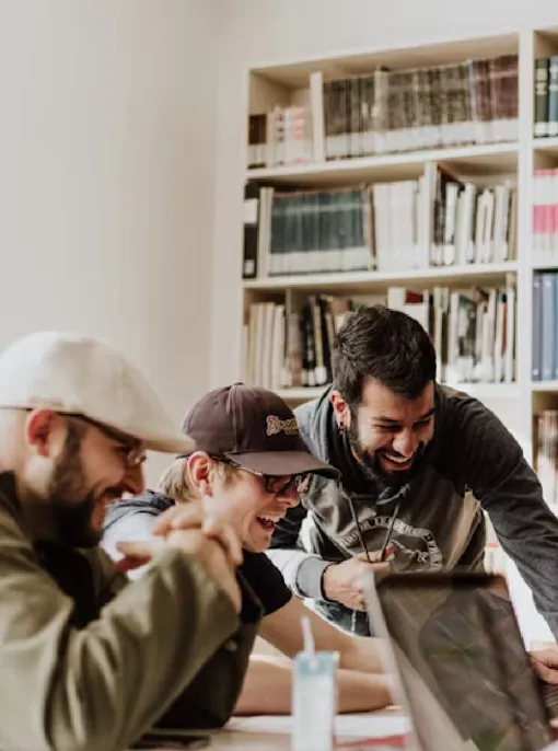 smiling-people-infornt-of-a-computer.jpg